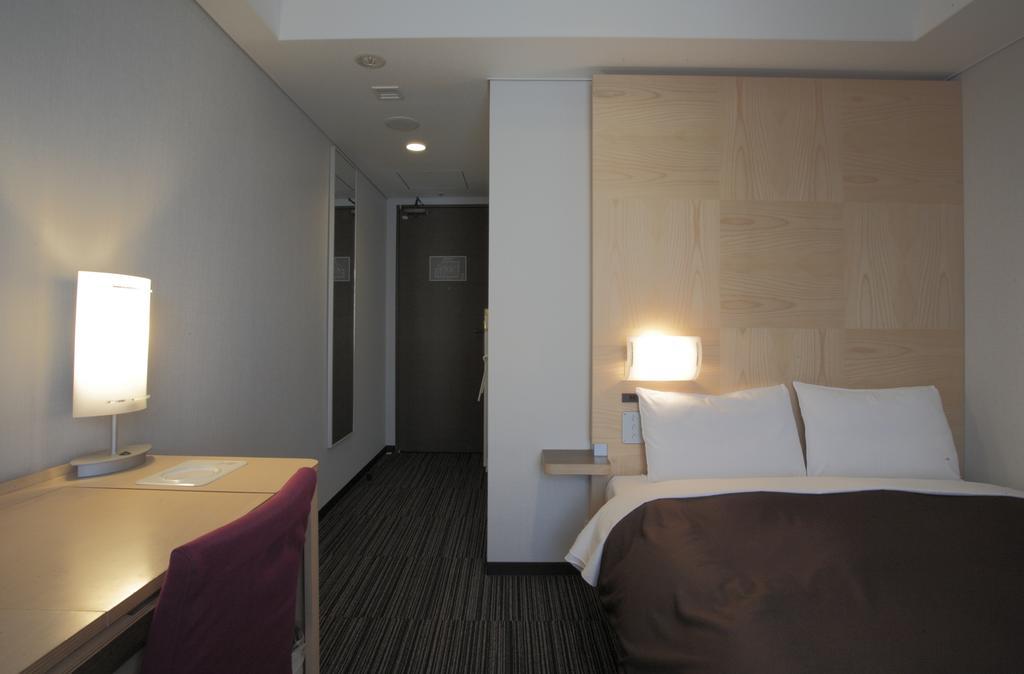 Bluewave Inn Yotsubashi Osaka Rum bild